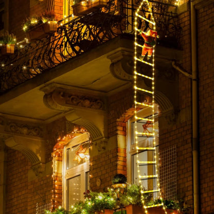 Père Noël lumineux sur échelle